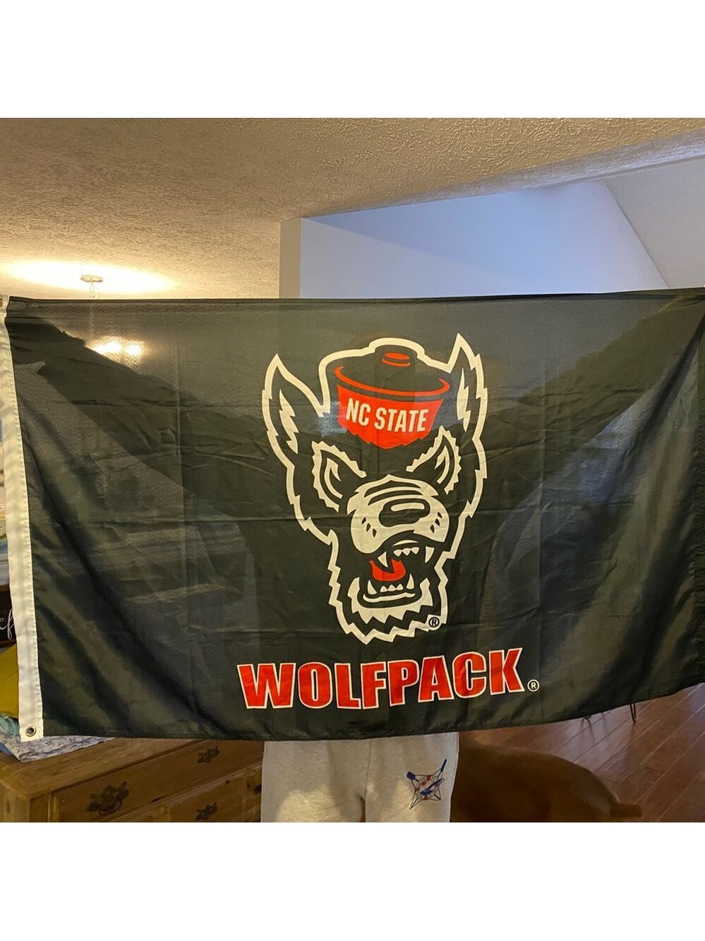 NC State Wolfpack flag 56” wide x 35” long, preowned, double stick tape residue